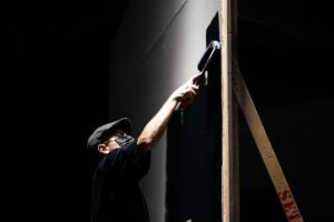 Man painting a wall